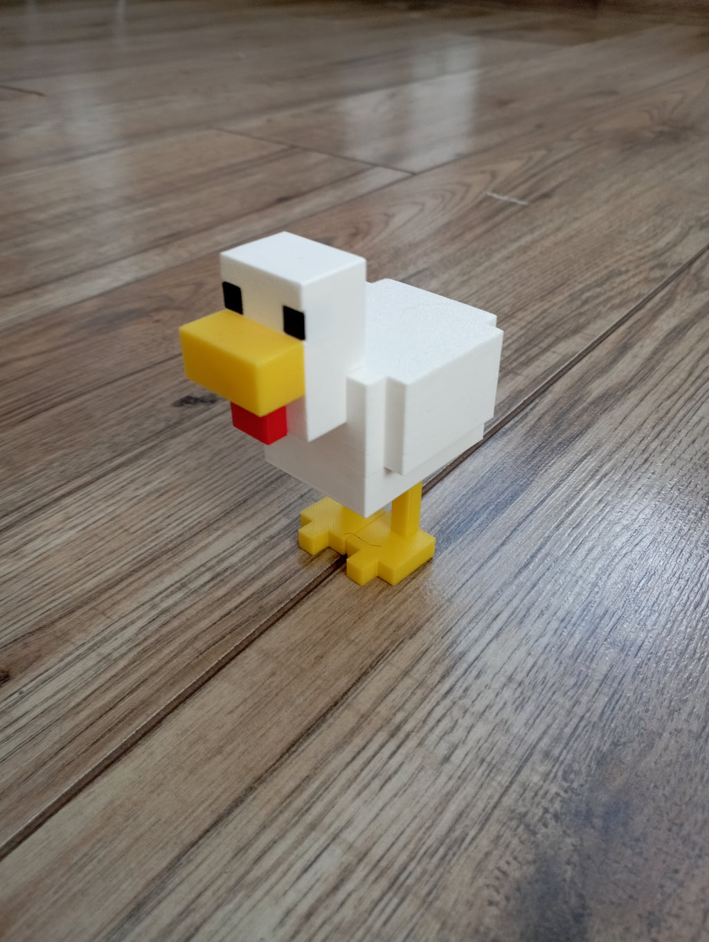 Mała figurka kurczaka z minecraft w 4 kolorach.