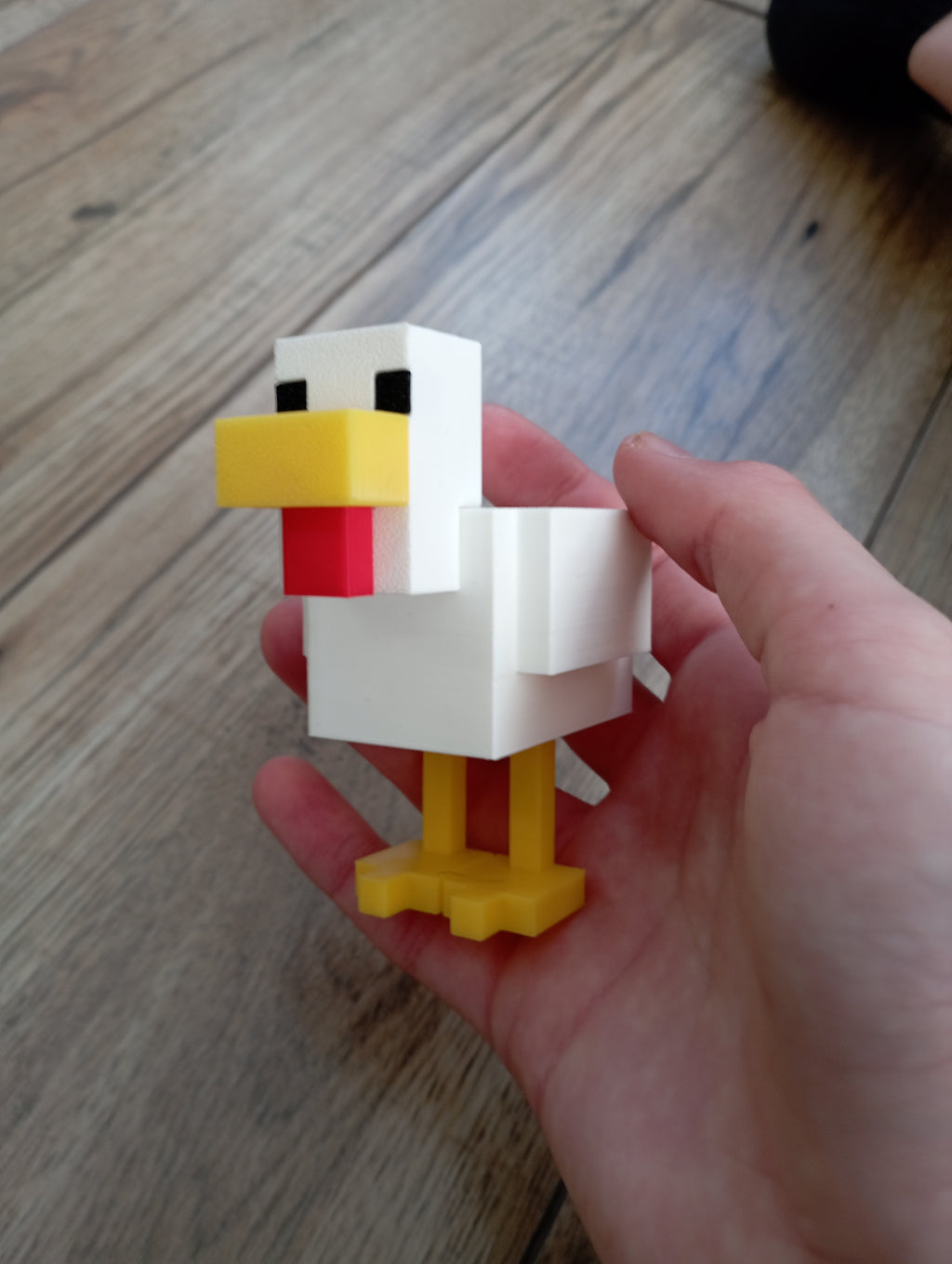 Mała figurka kurczaka z minecraft w 4 kolorach.
